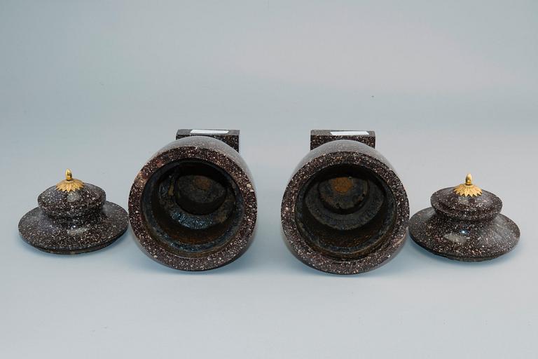 A PAIR OF CAPPED URNS.