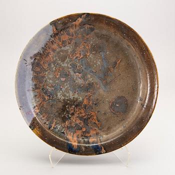 Carl Cunningham-Cole, a signed and dated stoneware plate 1974.