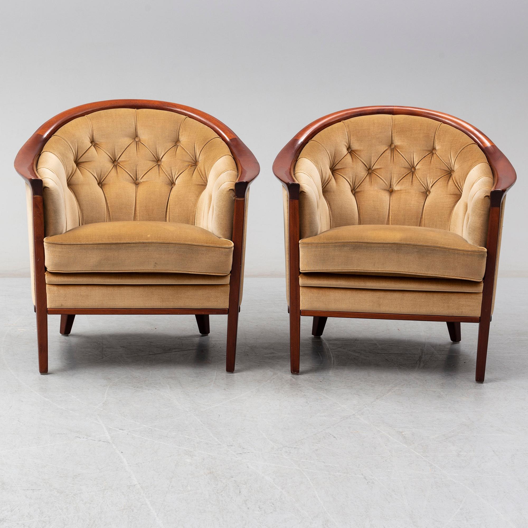 A pair of mahogany 'Fabiola' armchairs from Bröderna Andersson, second half of the 20th Century.