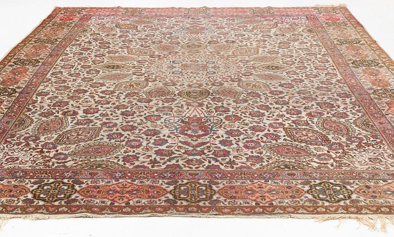 A Tabriz carpet, c. 390 x 305 cm.