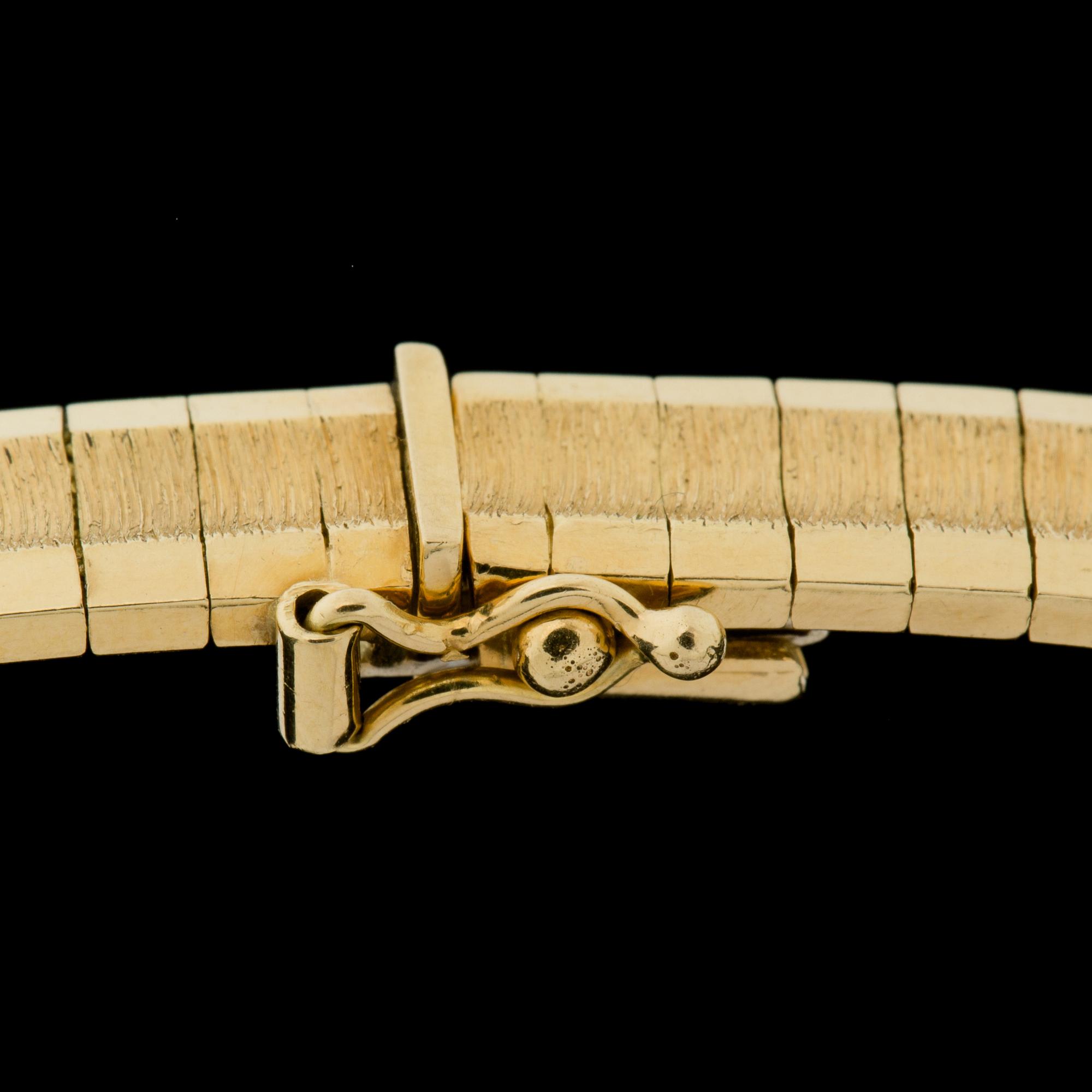 ARMBAND, 18 k guld. Vikt ca 25 g.