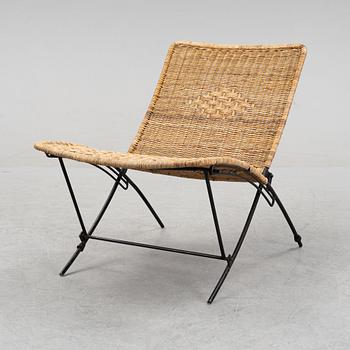 A rattan easy chair, 1960s.