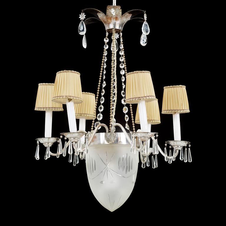TAKKRONA, nysilver, 1920/30-tal. Höjd ca 80 cm.