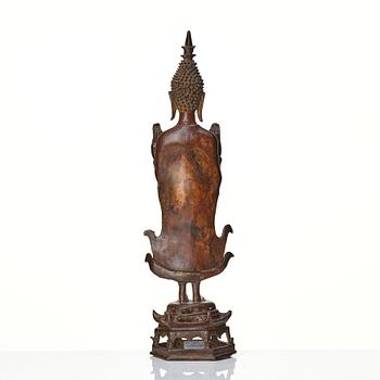 A standing sculpture of buddha, Laos, 18th Century.