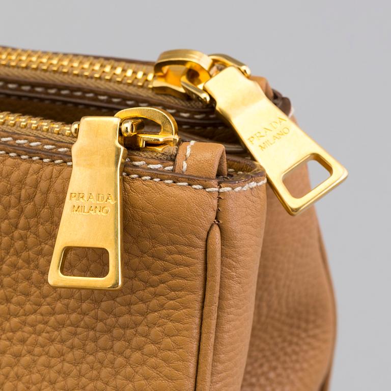 A Prada bag in vitello daino leather.