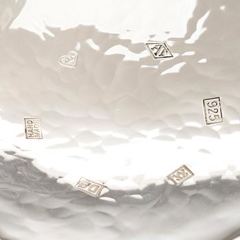 A set of three sterling silver and enamel bowls, maker's mark of A. Tillander, Turku 2005.