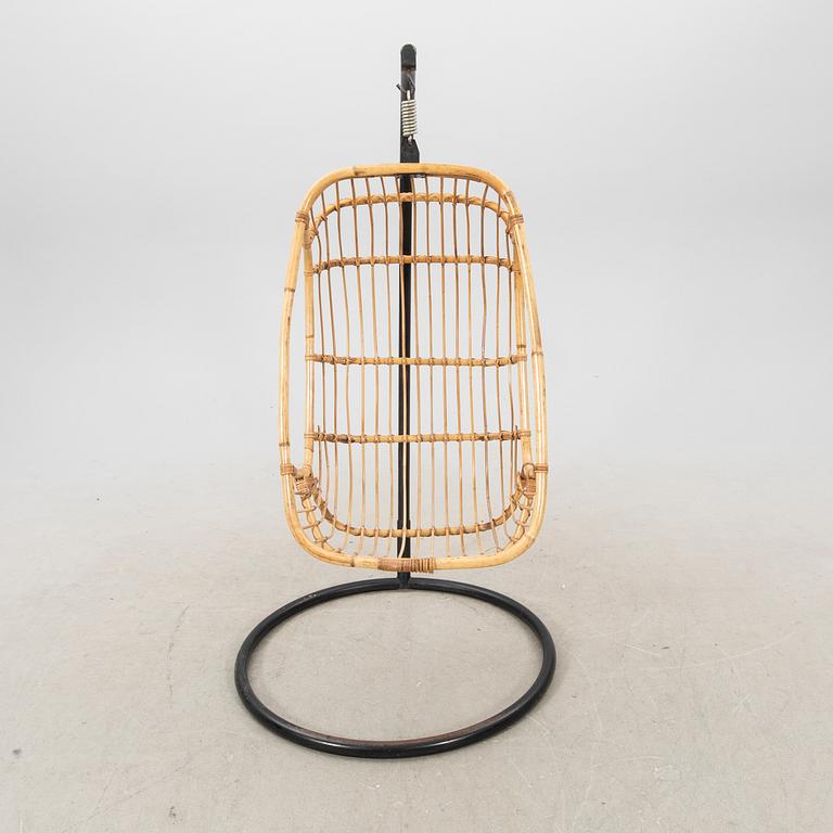 A bamboo and rattan hanging chair from the second half of the 20th century.