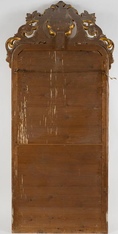 A gilt wood mirror and marble top console table, early 20th Century.