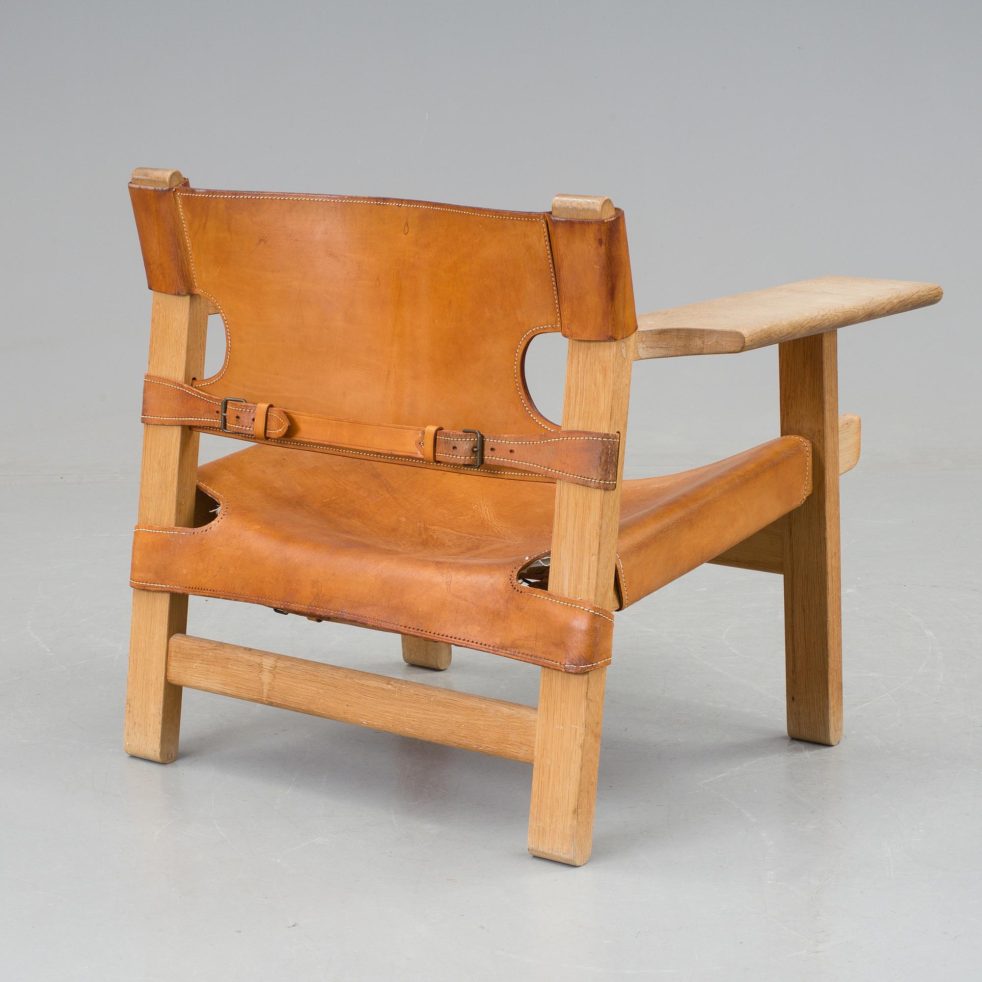 A Børge Mogensen oak and leather 'Spanish Chair' by Fredericia Stolefabrik, Denmark.