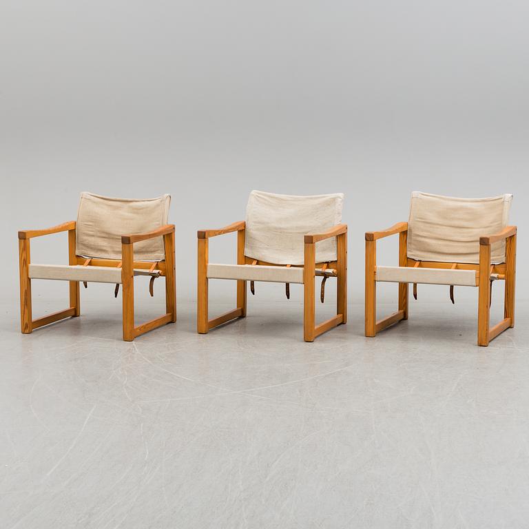 a set of three armchairs from the second half of the 20th century.