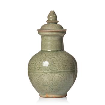 843. A celadon glazed jar with cover, Yuan dynasty (1271-1368).