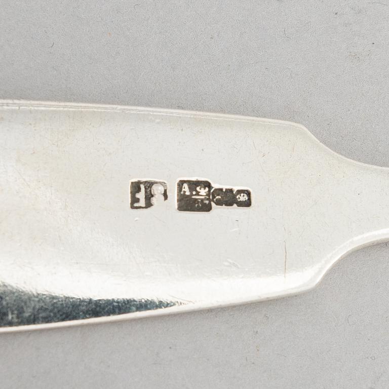 A Russian silver soup ladle and two pairs of silver spoons, Moscow 1874 and Saint Petersburg 1868 and 1887.