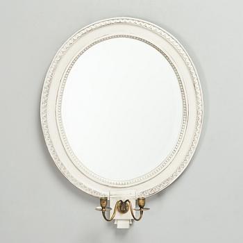 A 20th century, Gustavian style mirror sconce.