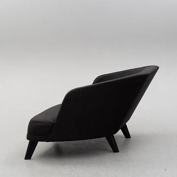A Jonny Johansson upholstered sofa, Acne Studios, O.H. Sjögren, Tranås, Sweden 2010.