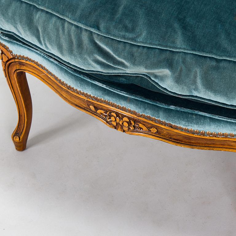 A pair of Louis XV style armchairs, mid-20th century.
