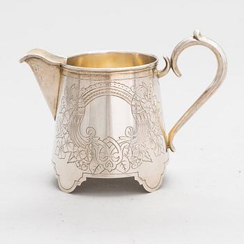 A Russian silver cream jug, Moscow, 1889. Later Estonian marks.