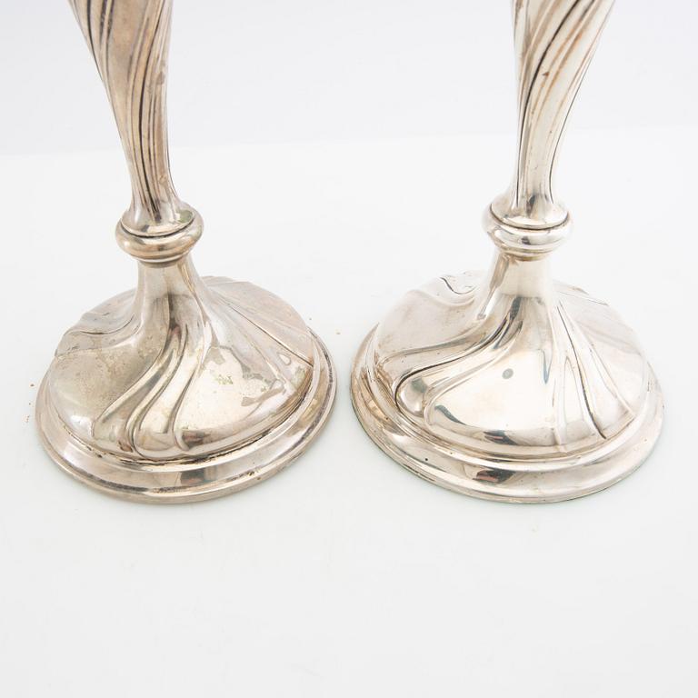 Candelsticks, a pair, silver, probably Hugo Grün, Denmark, 20th century.