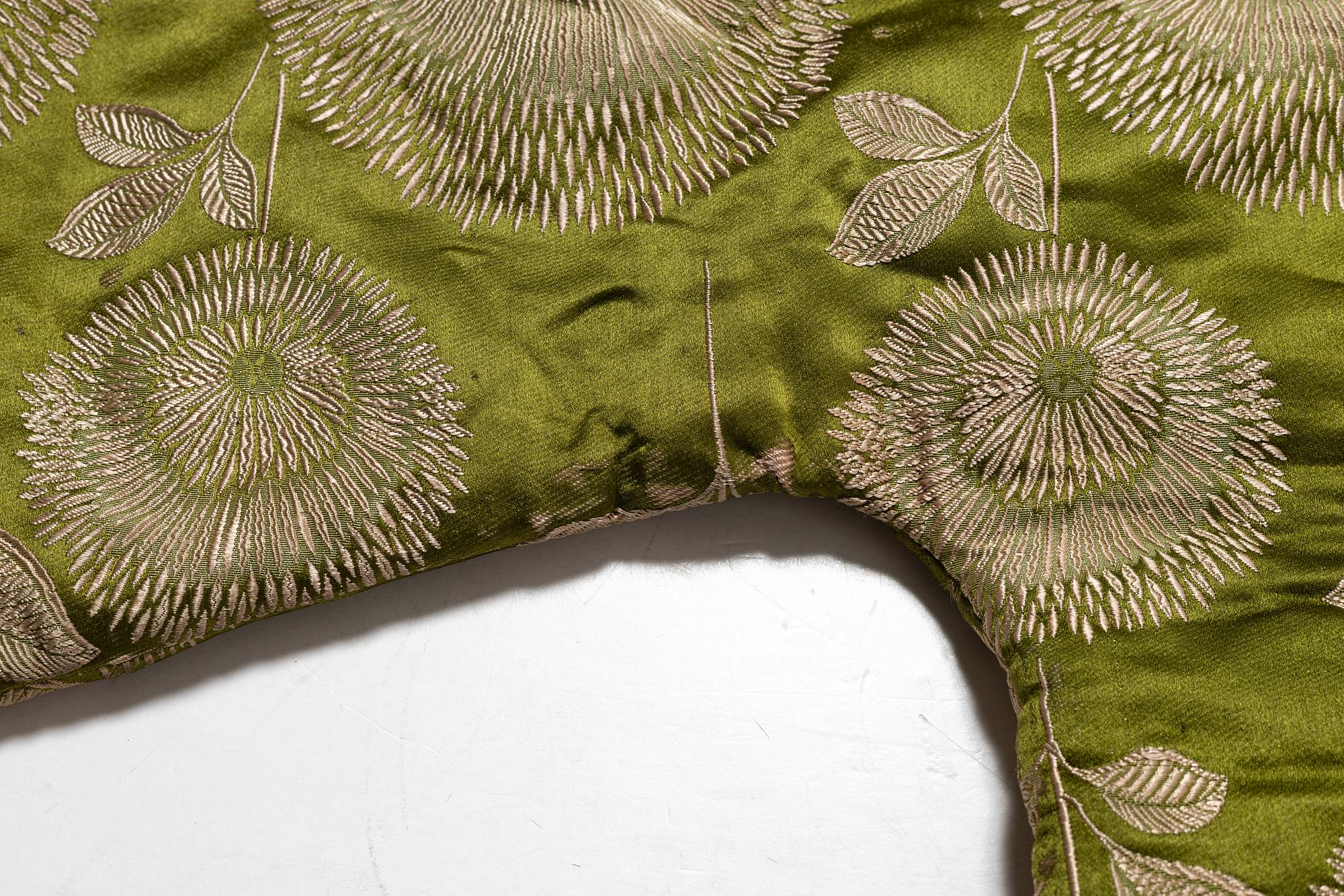 A Japanese silk brocade and fur childrens jacket, Meiji (1868-1912).