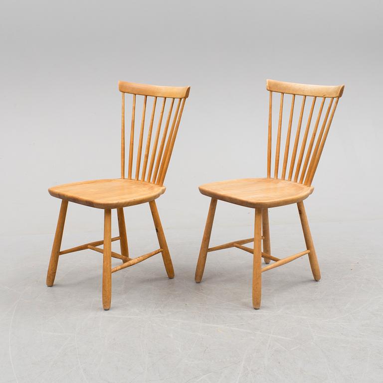 A pair of 'Lilla Åland' chairs by Carl Malmsten, second half of the 20th century.