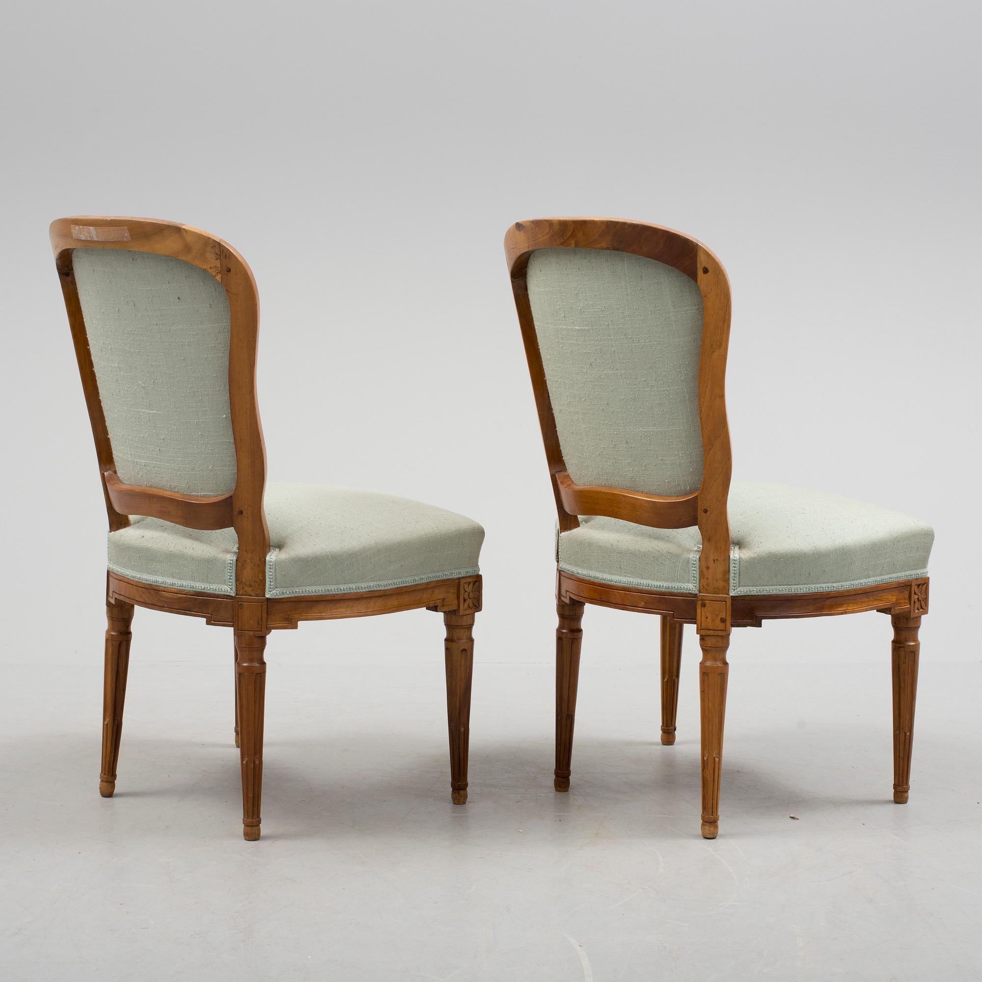 A pair of chairs, circa 1800.