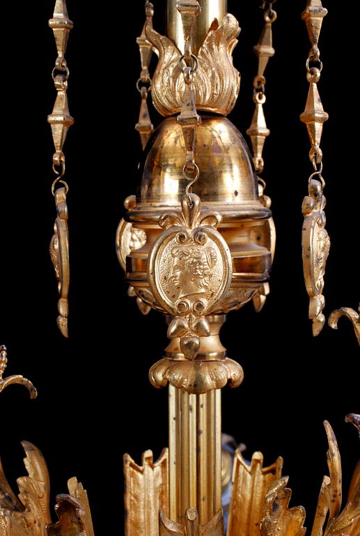 TAKARMARTUR, förgylld brons, 1800-tal. H 101.
