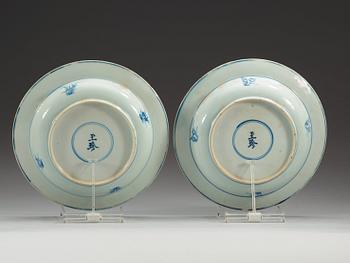 Two blue and white soup dishes, Qing dynasty, Kangxi (1662-1722), with hallmark.
