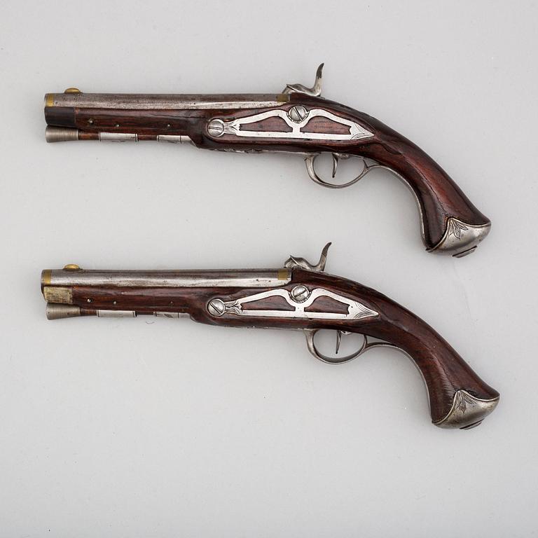 An end of the 18th century pair of converted percussion pistols.