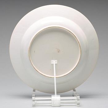 A set of eight blue and white armorial soup dishes, Qing dynasty, 18th Century.