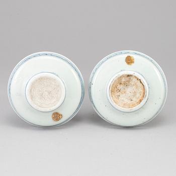 A pair of blue and white candle holders, Qing dynasty, late 19th century.