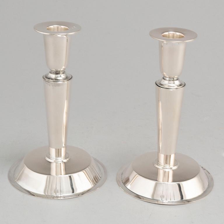 ERIC RÅSTRÖM, a pair of silver candlesticks, Stockholm 1954.