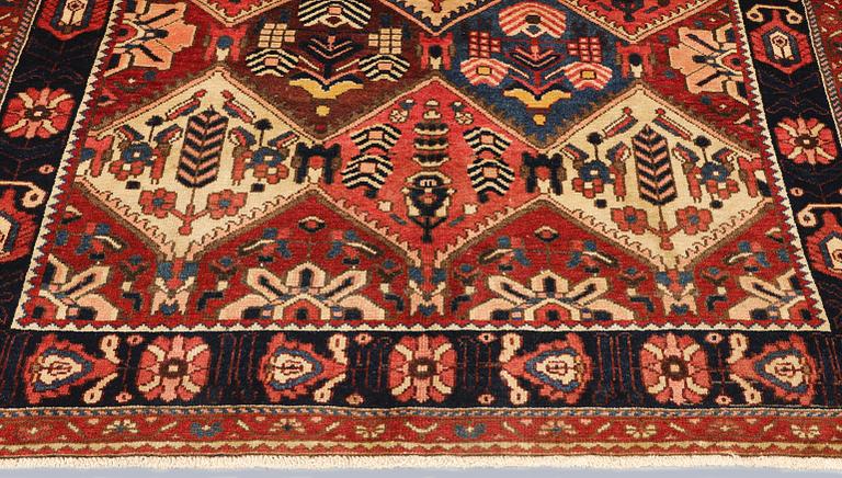 A rug, Bakhtiari, approx. 296 x 159 cm.