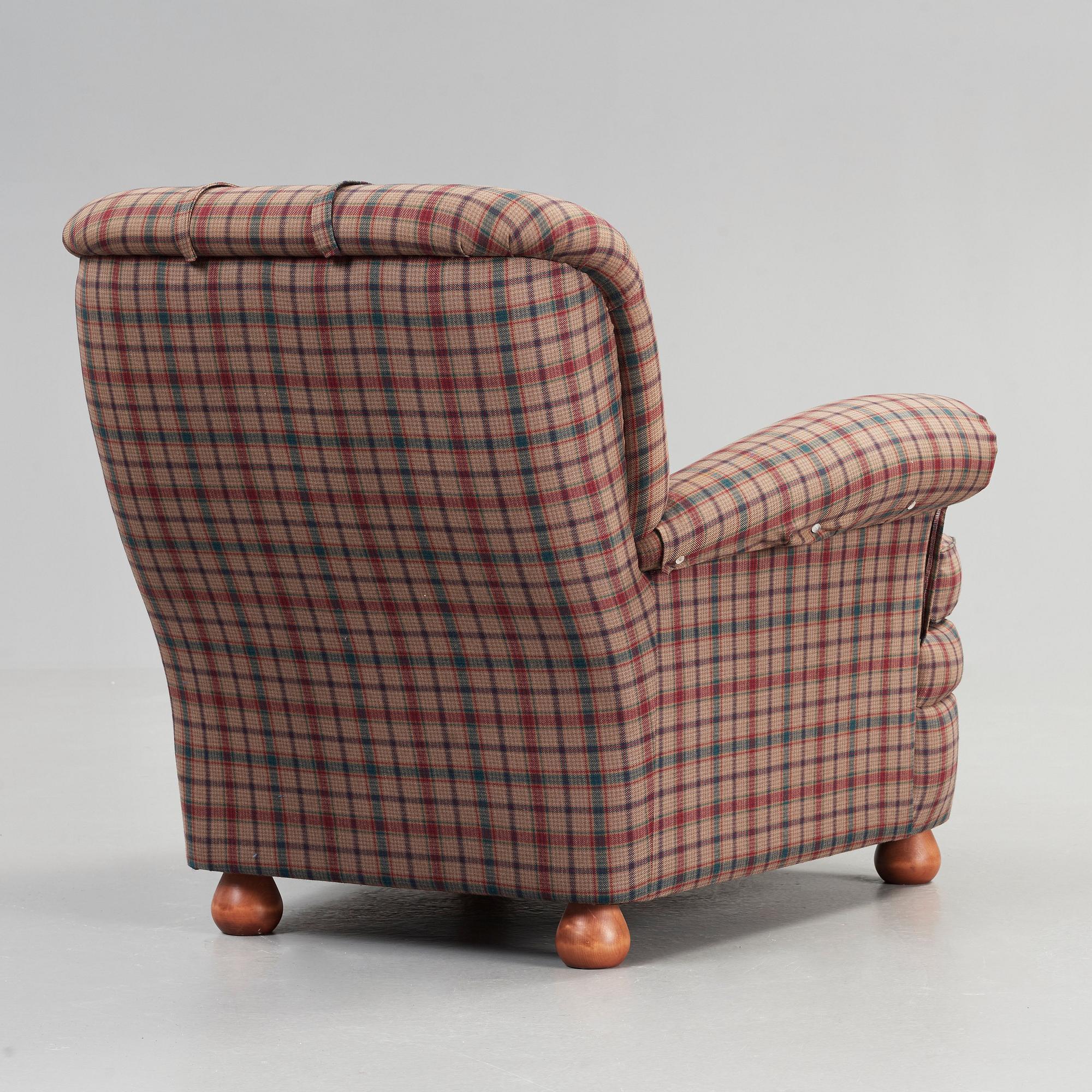 Josef Frank, a 'model 336' armchair, by Svenskt Tenn, Sweden.