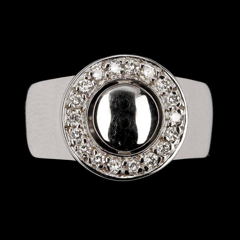 RING, 18k vitguld med briljantslipade diamanter, tot 0.30 ct enl gravyr.