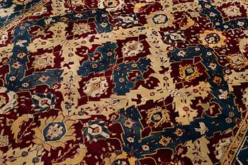 An Antique Agra carpet of 'Dragon Lattice' design, North India, 375 x 298 cm.