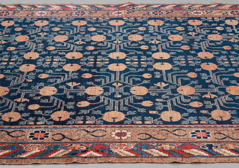 A carpet, a semi-antique Khotan, Xinjiang, China, ca 287-290,5 x 154-156 cm.