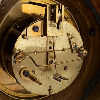 A Louis XVI-style wall clock, first half of the 20th Century.