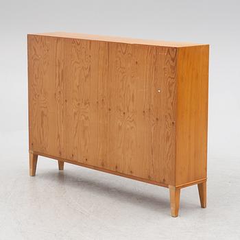 A Swedish Modern bookcase, 1940s.