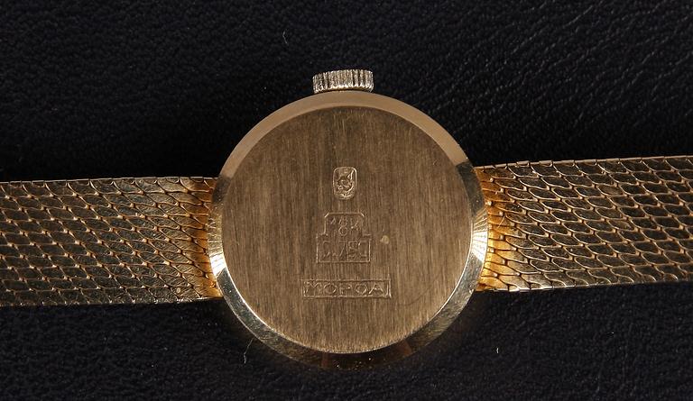 DAMARMBANDSUR, guld 18K, märkt Swaving, totalvikt 21 gram.