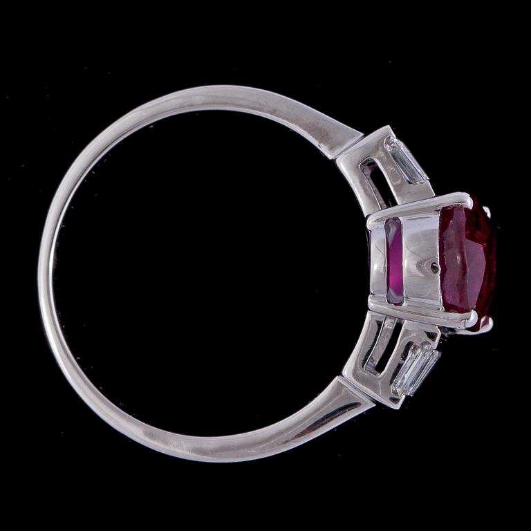 A ruby, 3.02 cts, and emerald cut diamond ring.