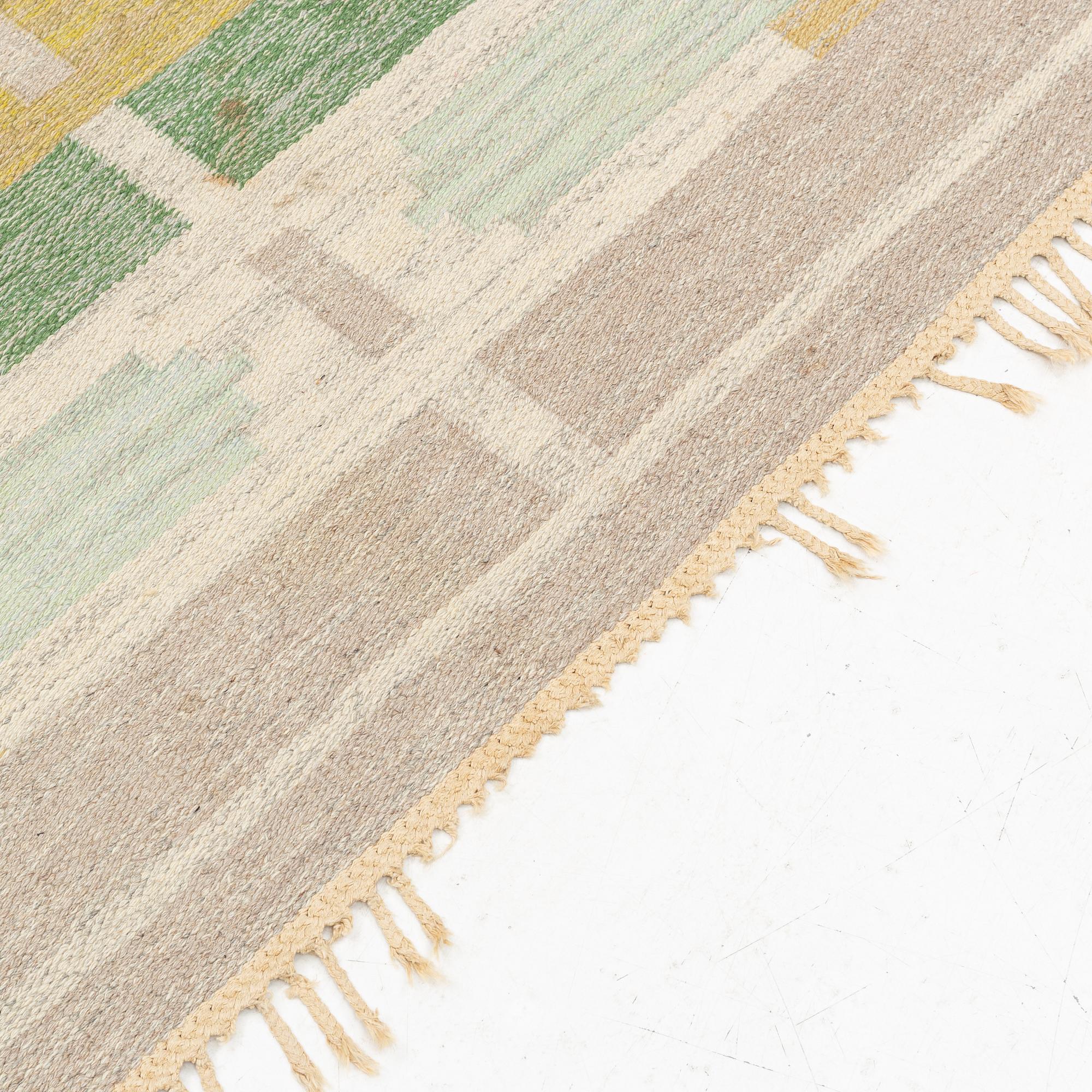 Mary Sandberg, a carpet, flat weave, circa 250 x 170 cm, signed MS KH.