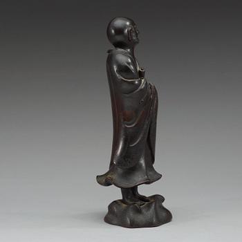 A bronze figure of one of the Lohans, Qing dynasty (1644-1912).