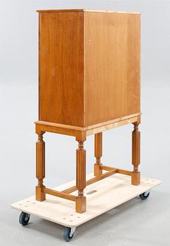 A cabinet by Eugen Höglund for Bild-verket in Vetlanda, around the mid 20th century.