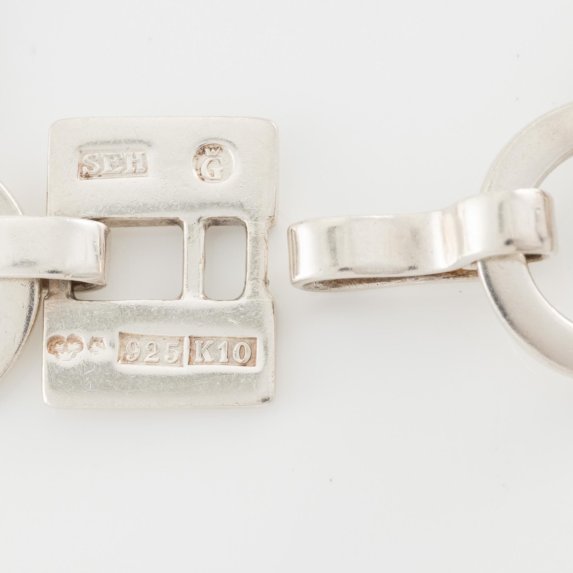 Sven-Erik Högberg, arm link, silver.