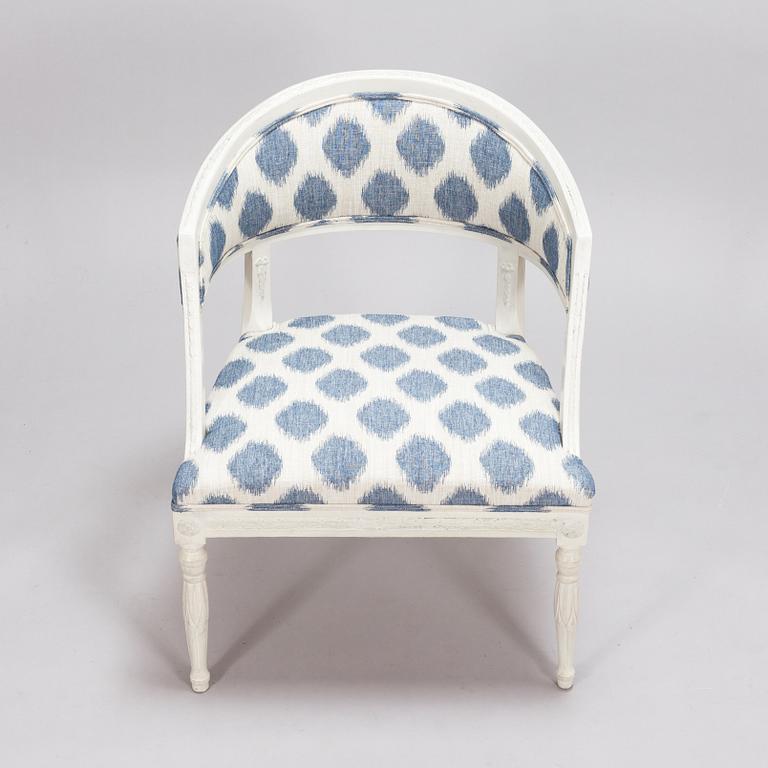 An early 20th century Gustavian style armchair.