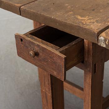 A 19th century painted gate leg table.