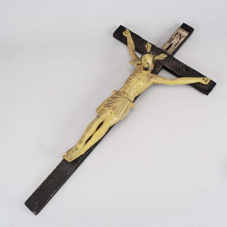 A wooden painted crucifix, 18th/19th century.