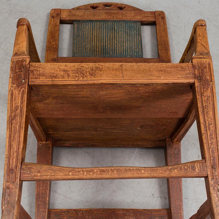 A 19th century folk art armchair.