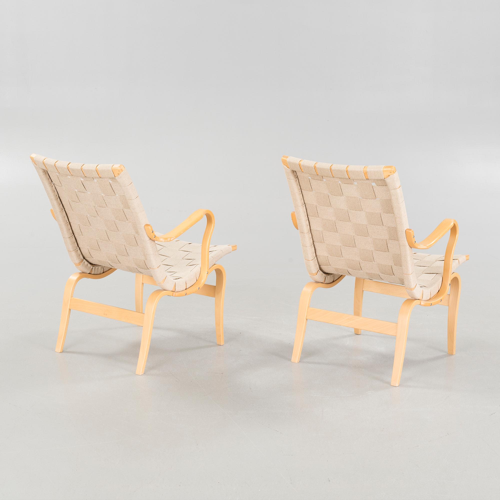 BRUNO MATHSSON, a pair of lounge chairs, model "Eva", late 20th century.