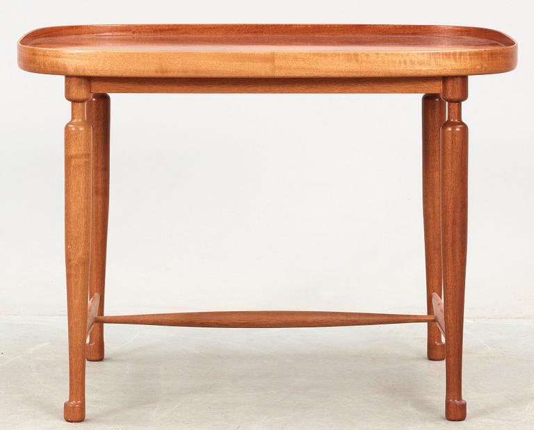 A Josef Frank mahogany table, Svenskt Tenn, model 921.