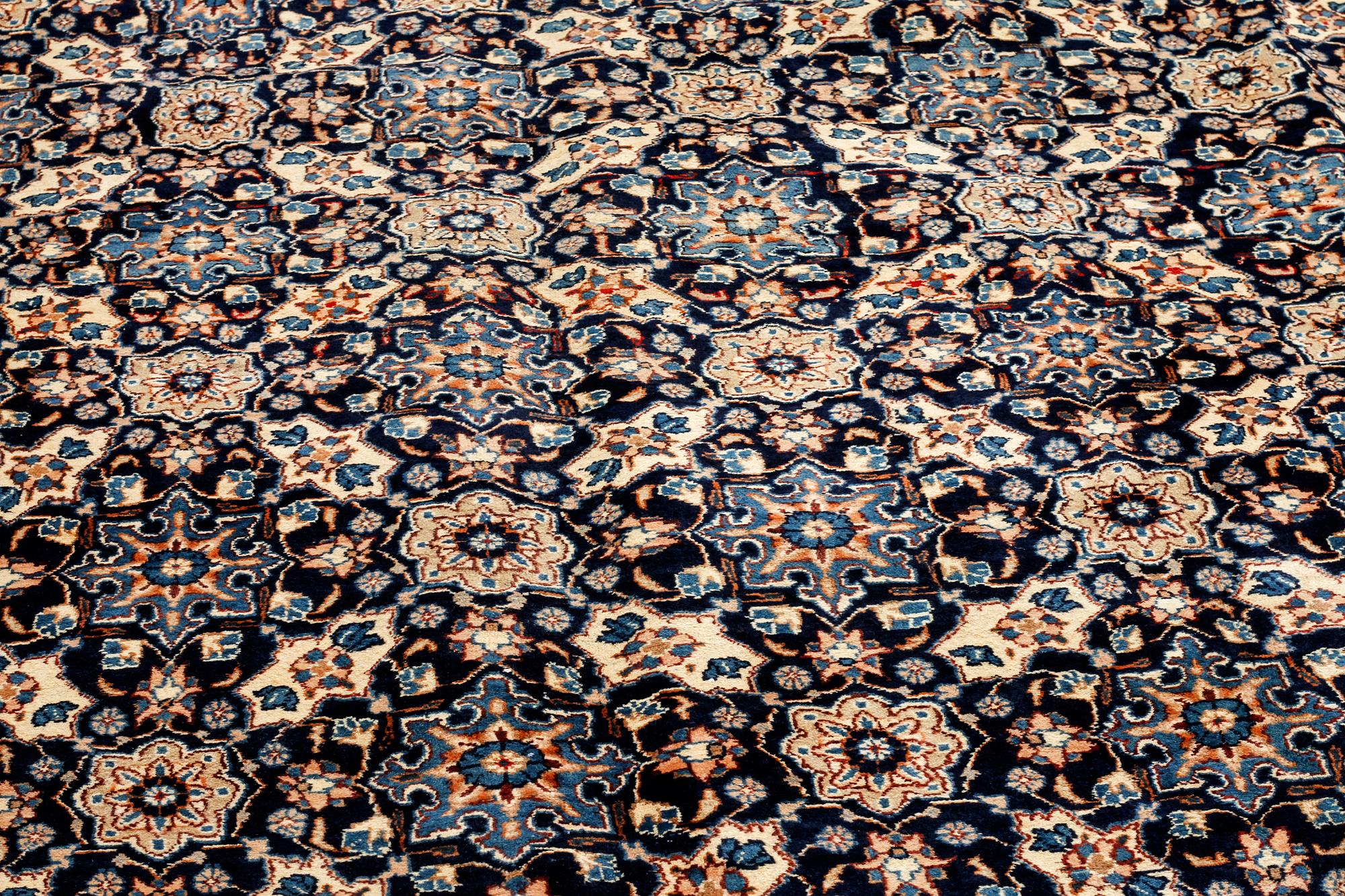 A KASHMAR RUG, 385 x 297 cm.